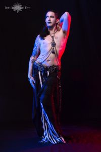 Male Belly Dancer Kamrah in goth costuming